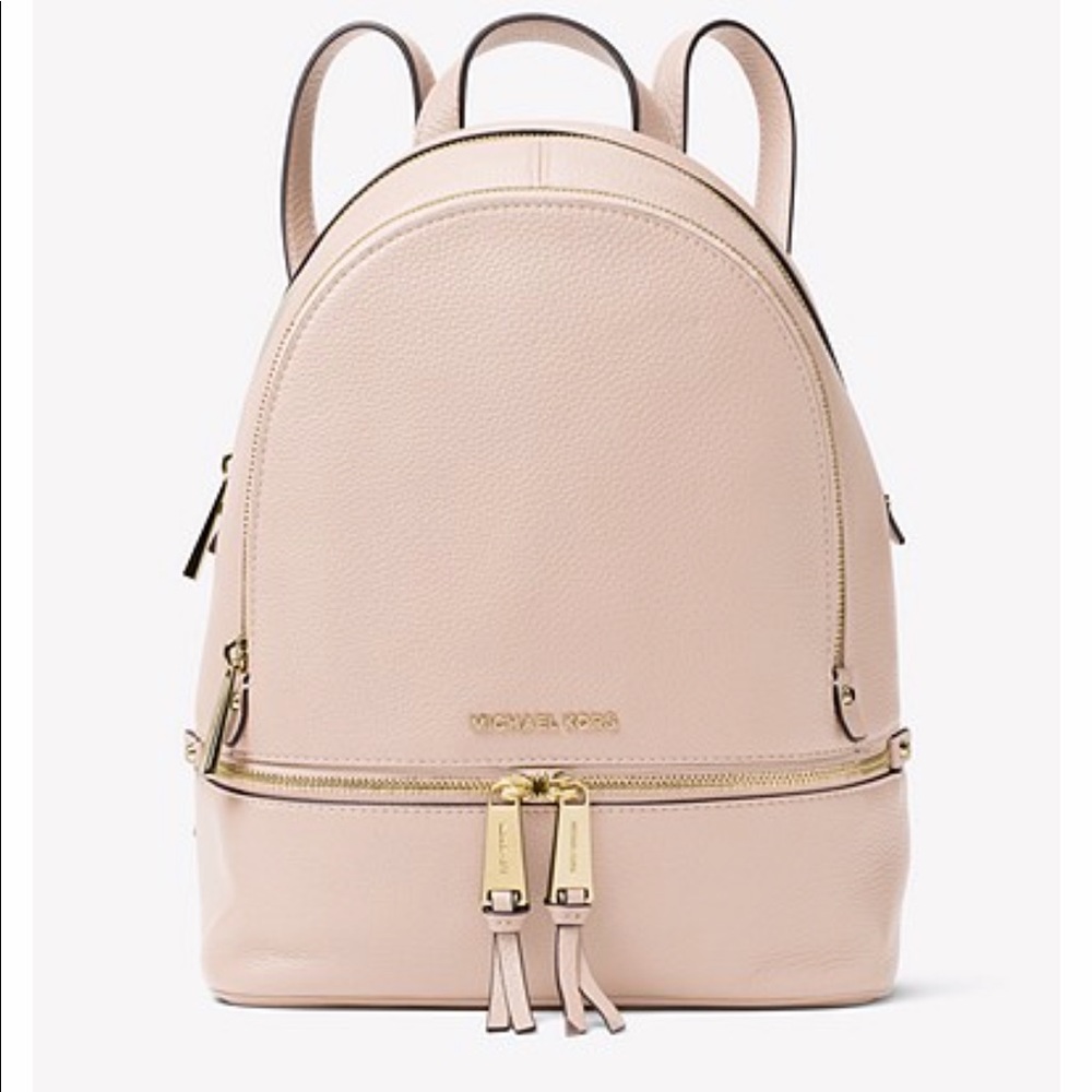 Michael KORS medium/small light pink backpack